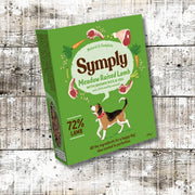 Symply Meadow Raised Lamb Adult Wet Dog Food box on wooden surface