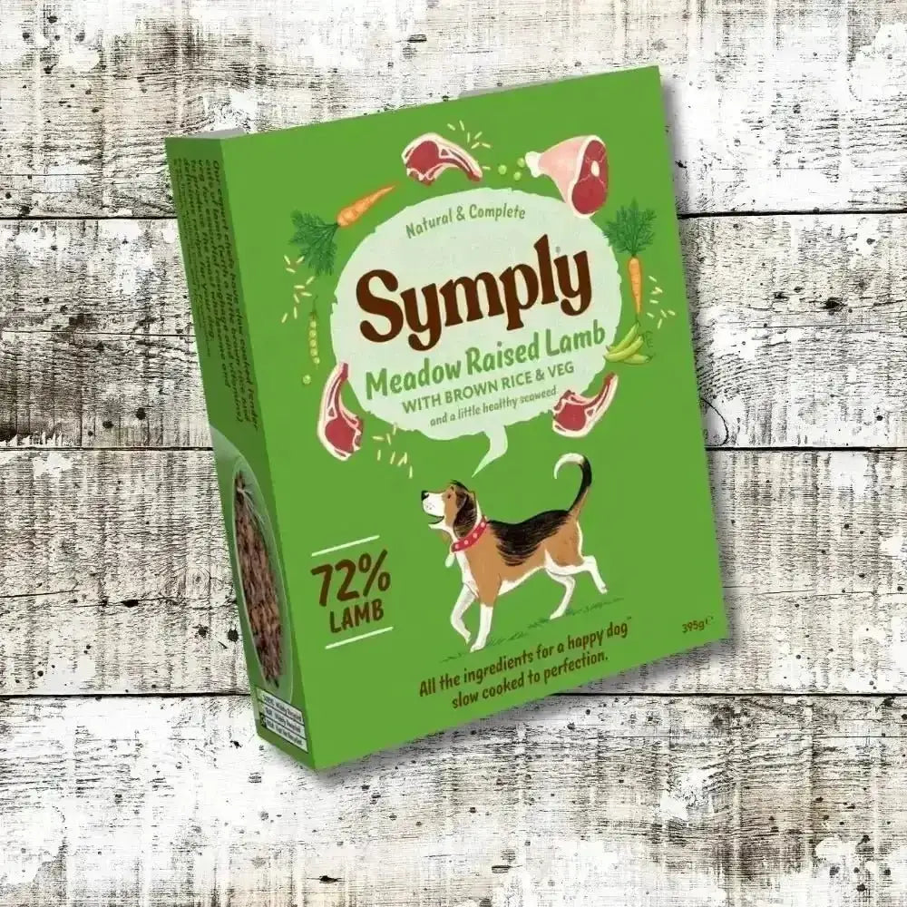 Symply Meadow Raised Lamb Adult Wet Dog Food box on wooden surface