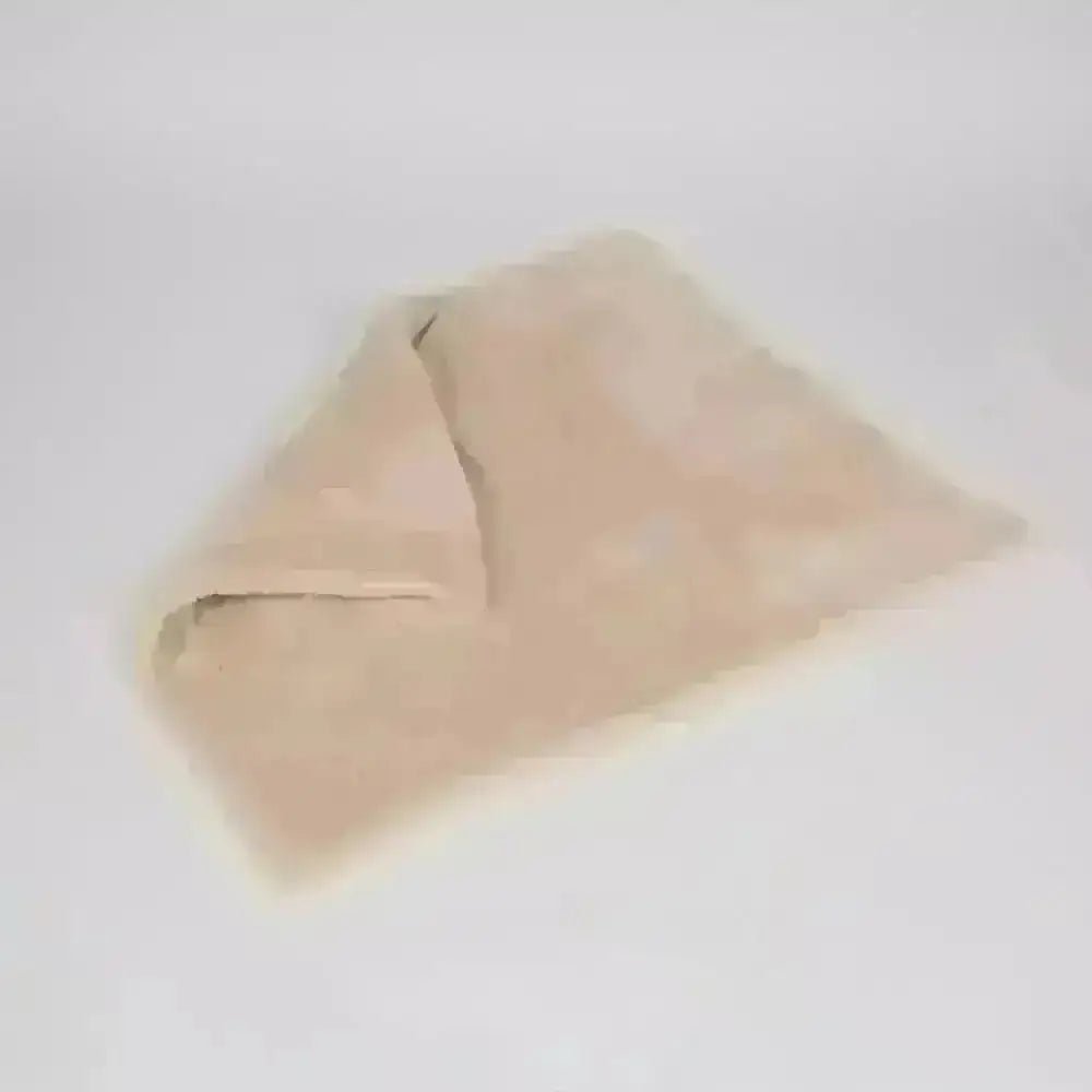 Beige microfiber dog blanket with folded corner design from Soho Poms