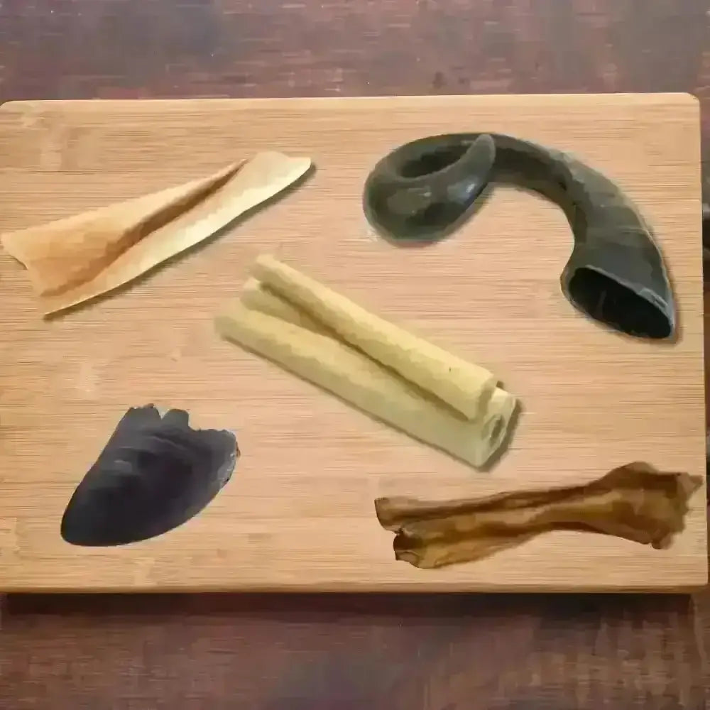 Tough Chew Box: Wooden board with natural dog treats and black horn chew