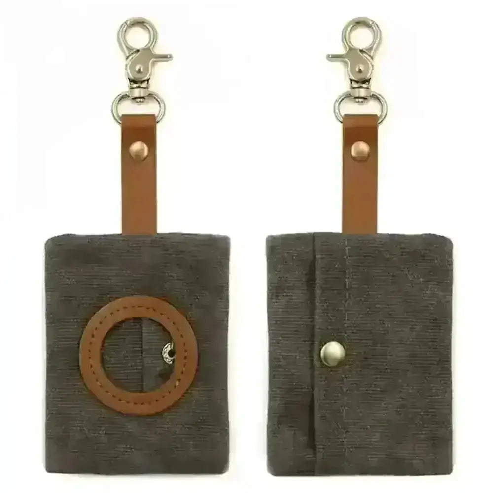 Olive green waxed canvas poop bag holder with brown leather strap