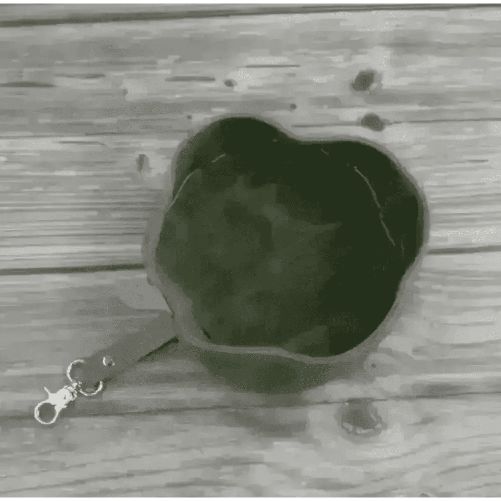 Introducing Dapper Dog’s waxed canvas travel dog bowl in olive green with leather strap