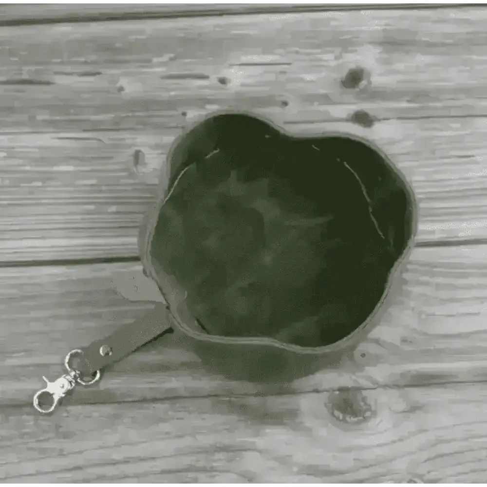 Introducing Dapper Dog’s waxed canvas travel dog bowl in olive green with leather strap