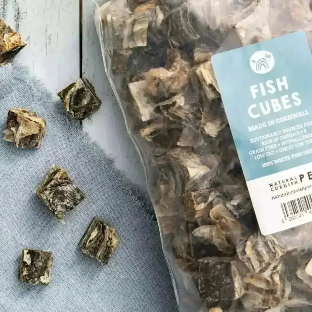 White Fish Cubes For Dogs in clear plastic bag with blue label, natural fish treats