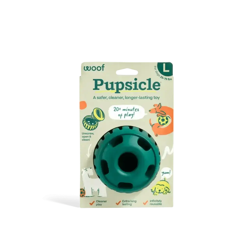 Dog enrichment toy Woof Pupsicle Forest Green with textured green rubber ball and black center