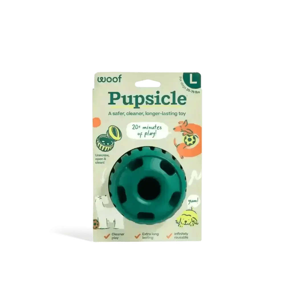 Dog enrichment toy Woof Pupsicle Forest Green with textured green rubber ball and black center