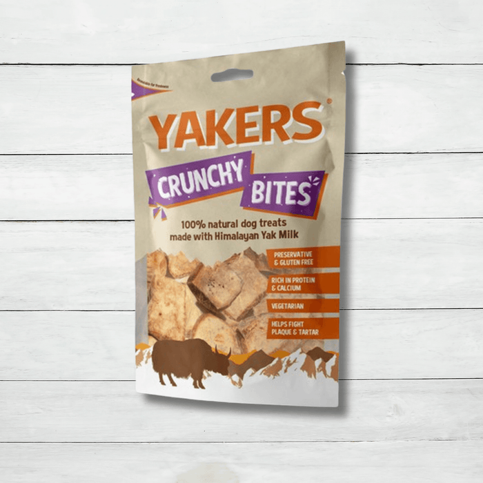 Yakers Crunchy Bites sits on a white rustic background