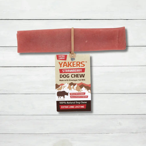 Yakers Strawberry Yak Chew sits on a rustic background. This product can be bought at The Pets Larder natural pet store