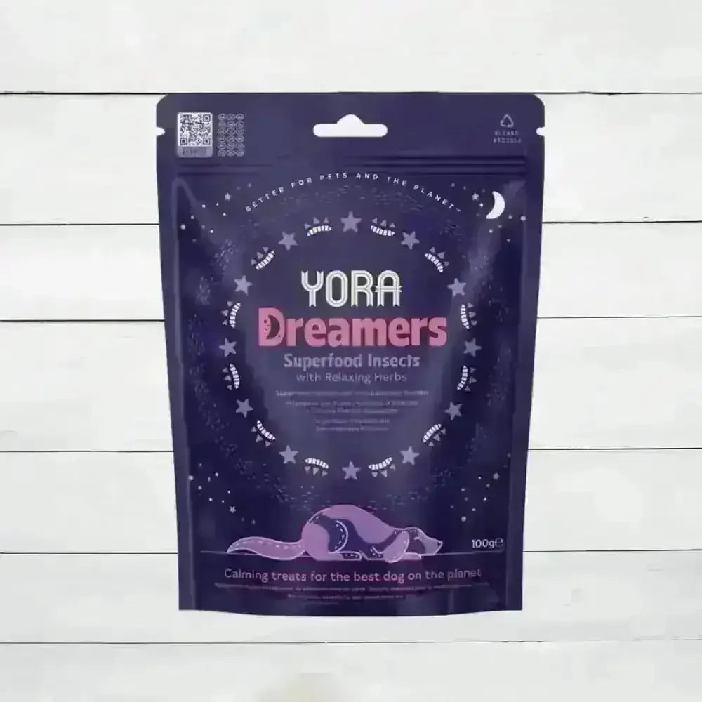 YORA Dog Dreamers calming treats with superfood insects, valerian root, and lemon balm in a dark purple pouch