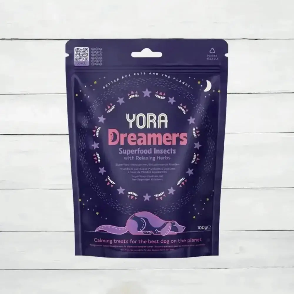 YORA Dog Dreamers calming treats with superfood insects, valerian root, and lemon balm in a dark purple pouch