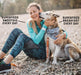 A woman and her god sit on a pebble beach, the dog licks the womans face happily. They are surrounded by graphics to show the benefits of Yora Insect based food